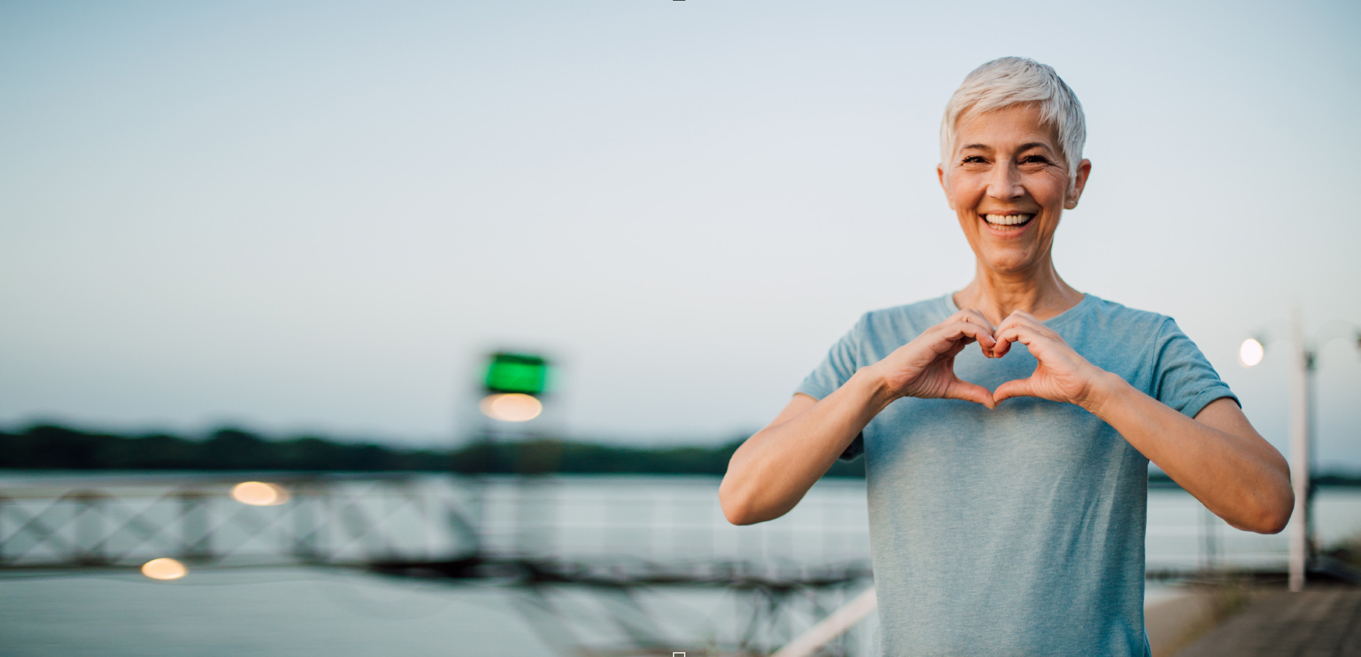 Woman making heart with hands